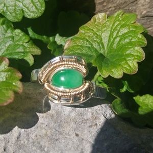 Silver and gold wire wrapped. Dyed jade ring.